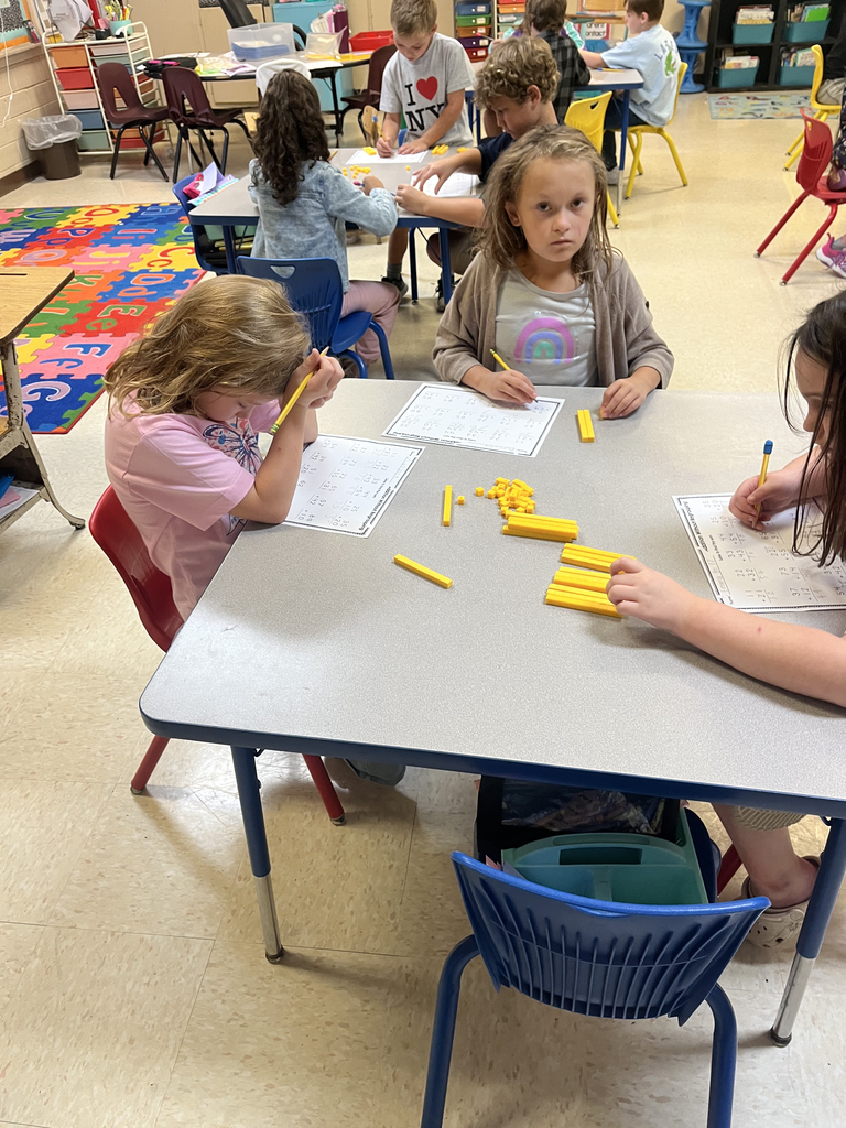 2nd grade students using manipulatives