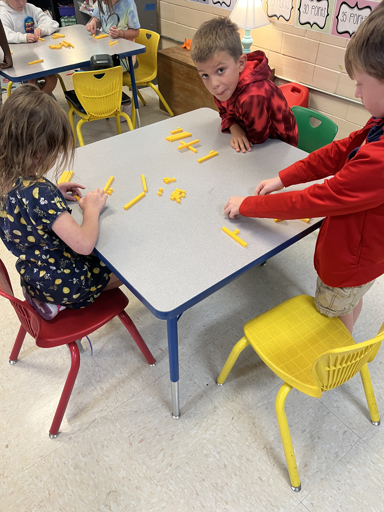 2nd grade students using manipulatives