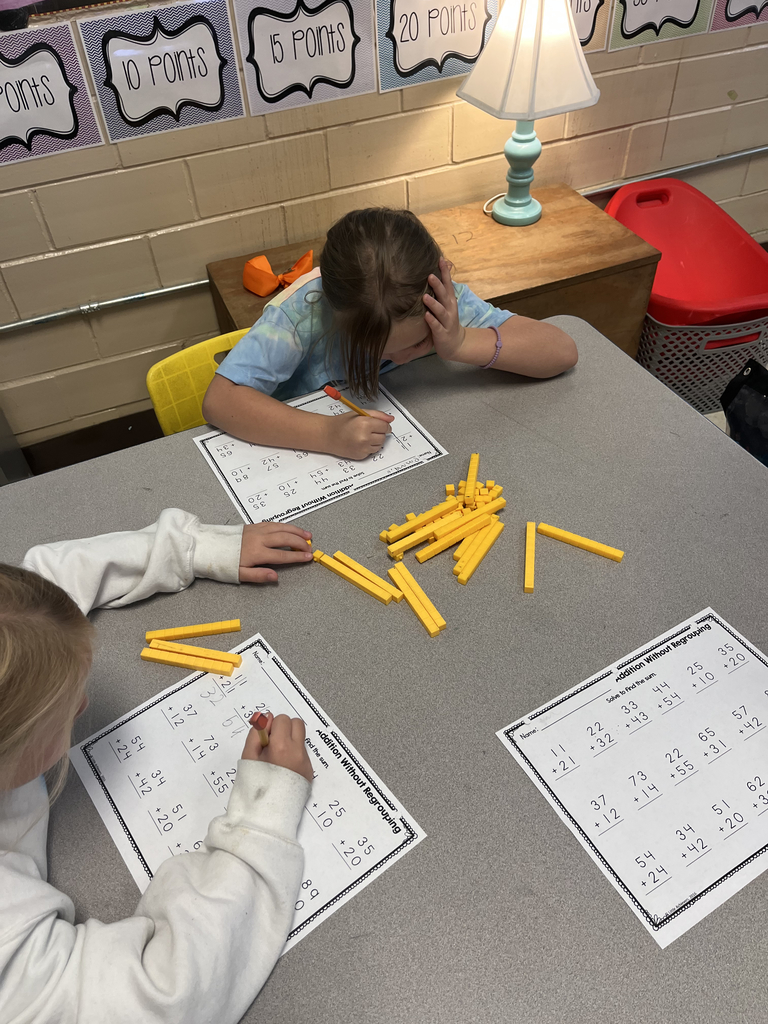 2nd grade students using manipulatives