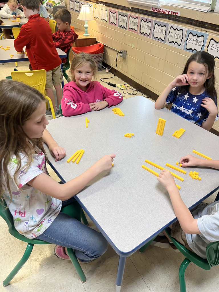 2nd grade students using manipulatives