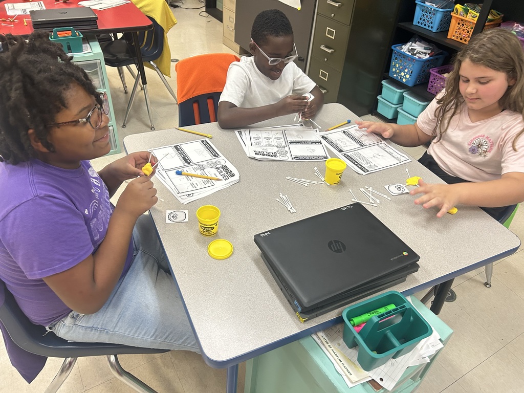 3rd grade student working on math project