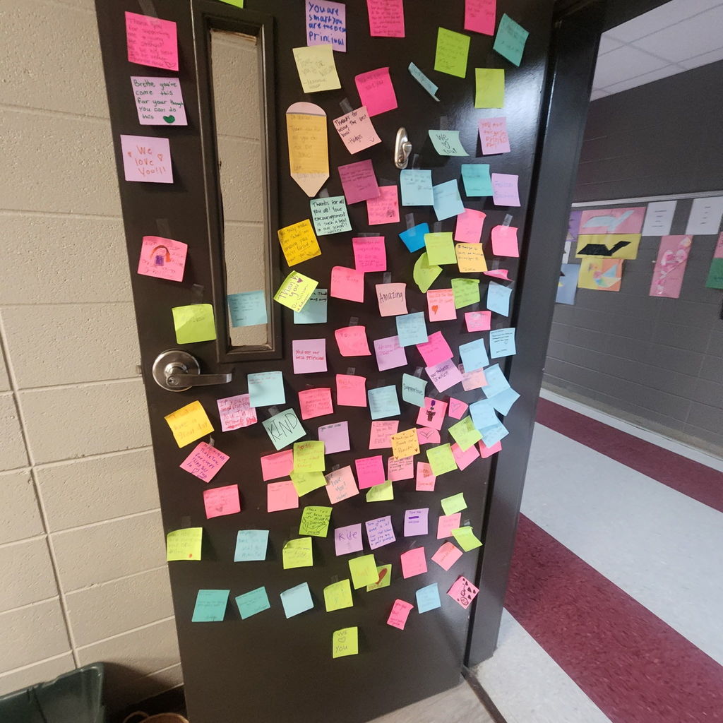 post it notes stuck to a door