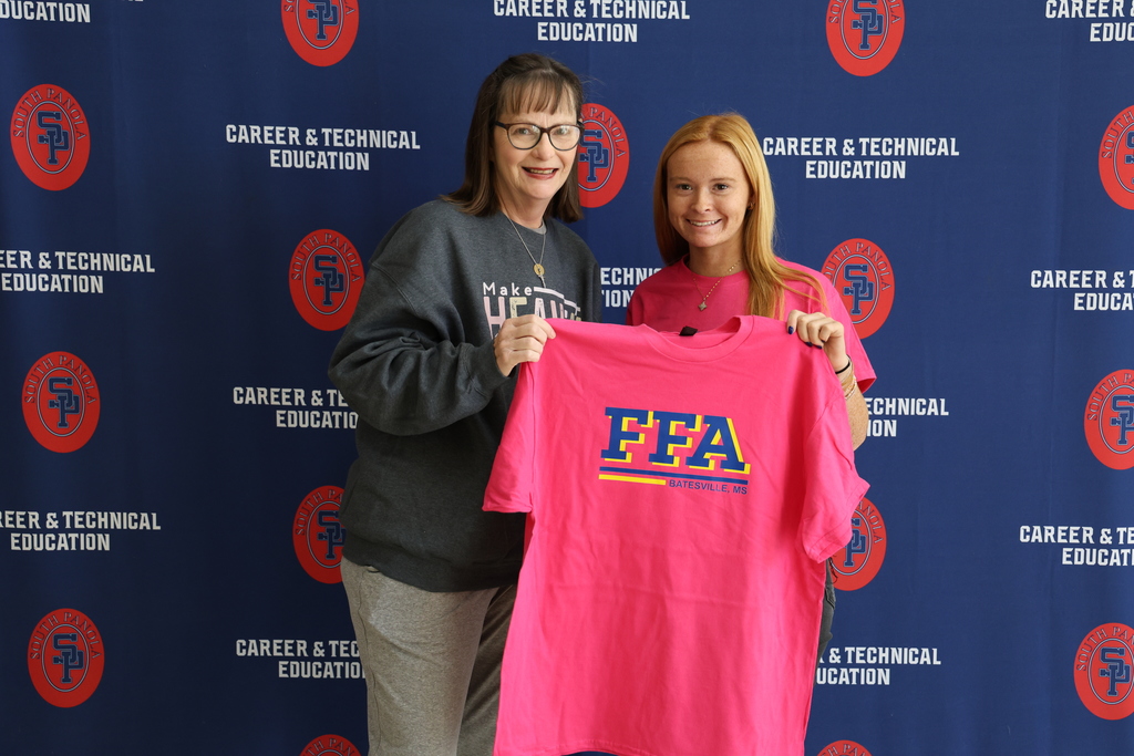 In recognition of Breast Cancer Awareness Month, the South Panola FFA Chapter proudly presented its 2025 “Blue & Gold Goes Pink” shirts to several Panola County residents who have courageously battled breast cancer.