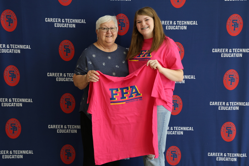 In recognition of Breast Cancer Awareness Month, the South Panola FFA Chapter proudly presented its 2025 “Blue & Gold Goes Pink” shirts to several Panola County residents who have courageously battled breast cancer.