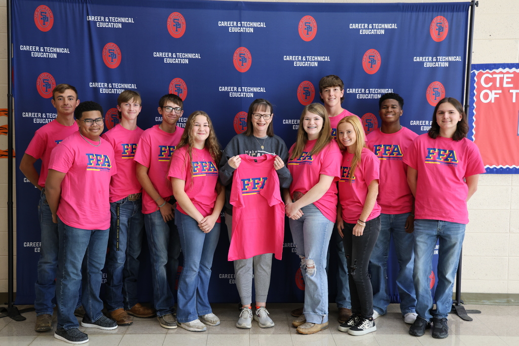 In recognition of Breast Cancer Awareness Month, the South Panola FFA Chapter proudly presented its 2025 “Blue & Gold Goes Pink” shirts to several Panola County residents who have courageously battled breast cancer.