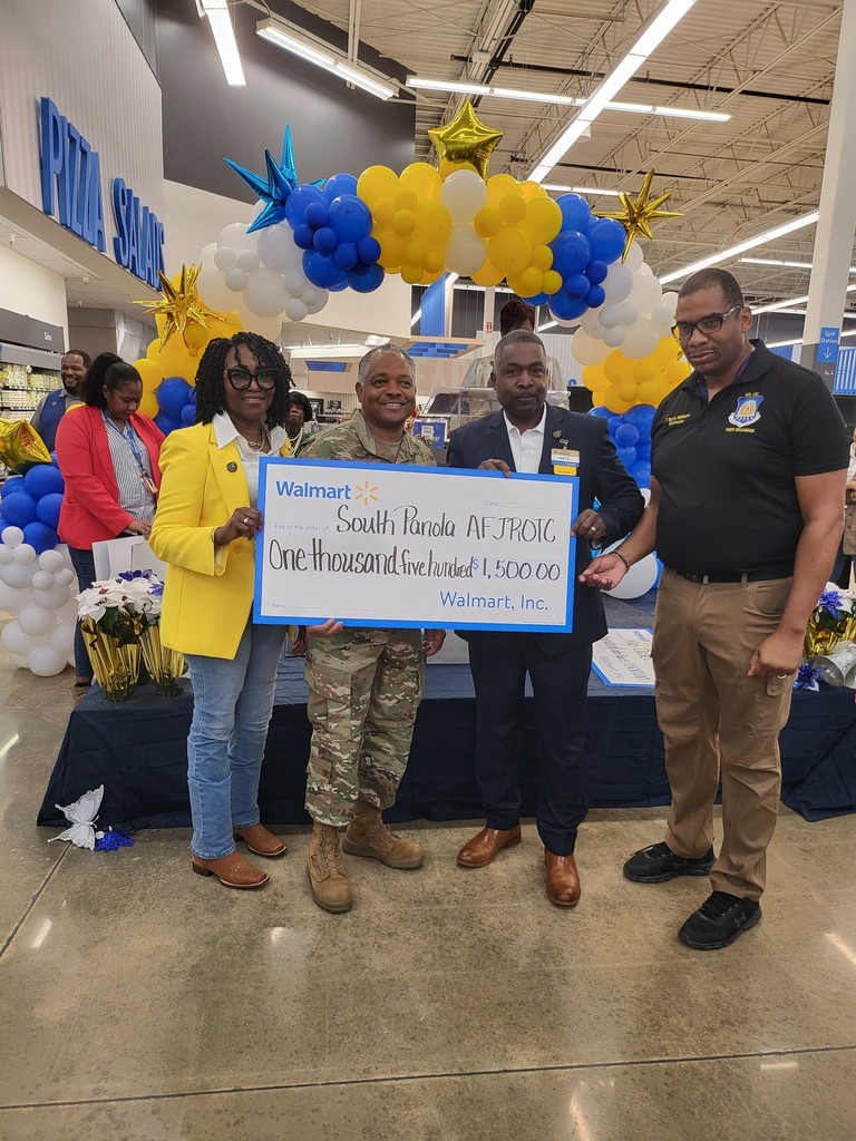 ROTC attends the Walmart grand re-opening and receives donation