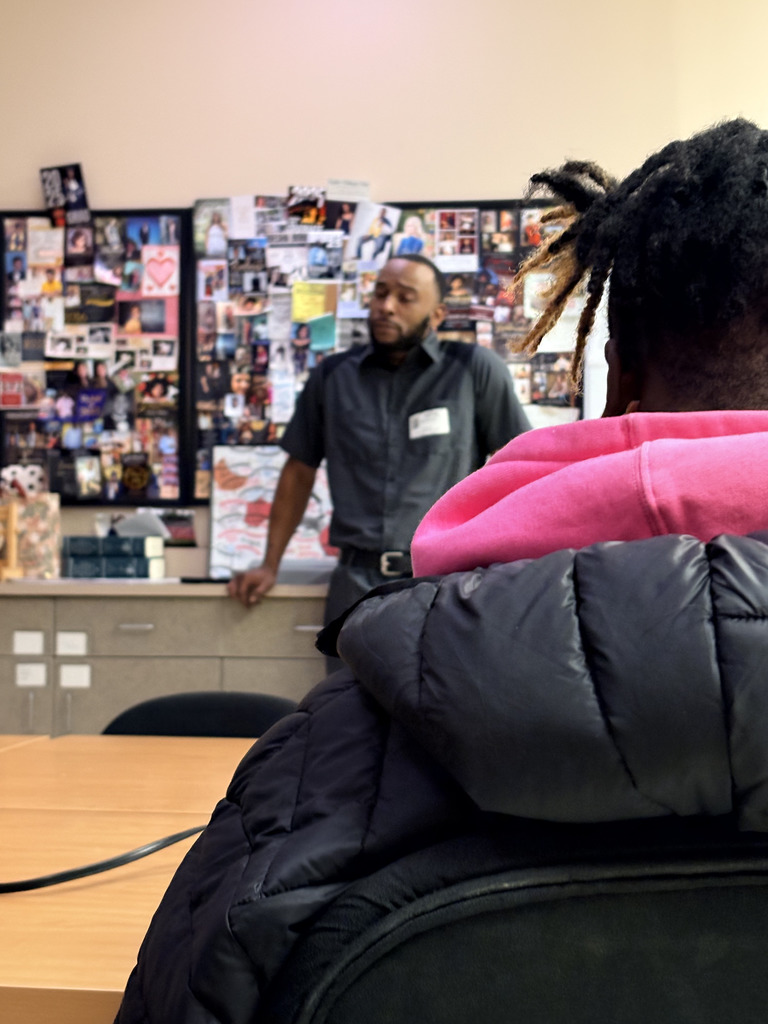 Guest speaker talking to students about his career.