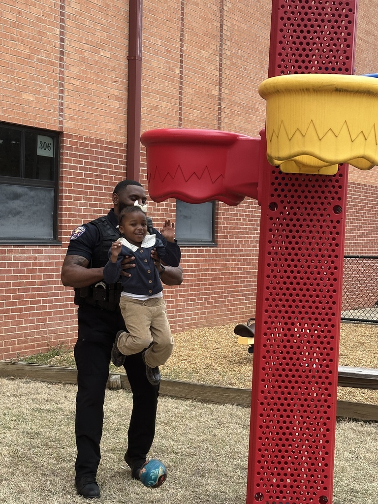 Sergeant Jarvis Smith takes time out of his day to come outside and play with our Tiger Care kids on the playground.