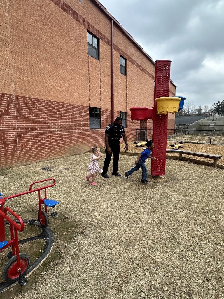 Sergeant Jarvis Smith takes time out of his day to come outside and play with our Tiger Care kids on the playground.