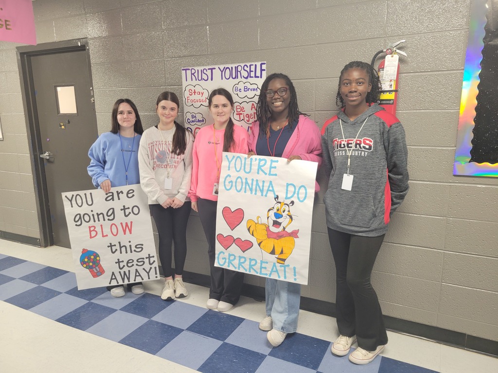 Educator preparation students made and hung up signs to help encourage students at BIS and BMS to do well on their upcoming state tests. 