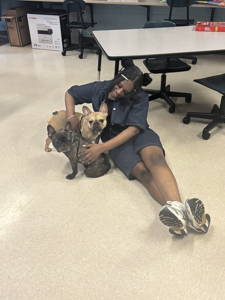 SPHS Health Science students learning firsthand about the benefits of animal-assisted therapy.
