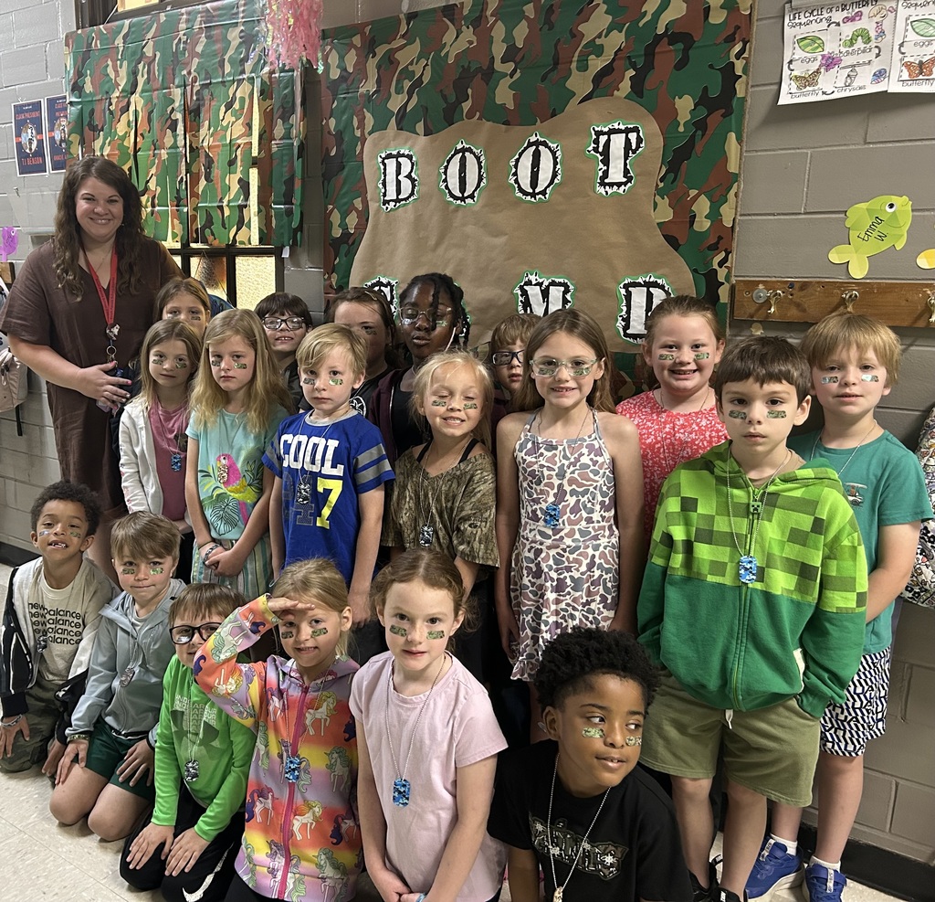 group of first graders wearing camo