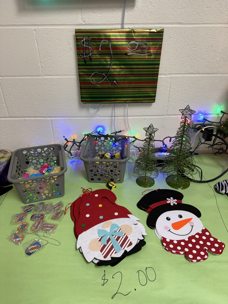 $2.00 felt door hangers, dog tag necklaces, sequin and pop it key chains, measuring tape key chains 