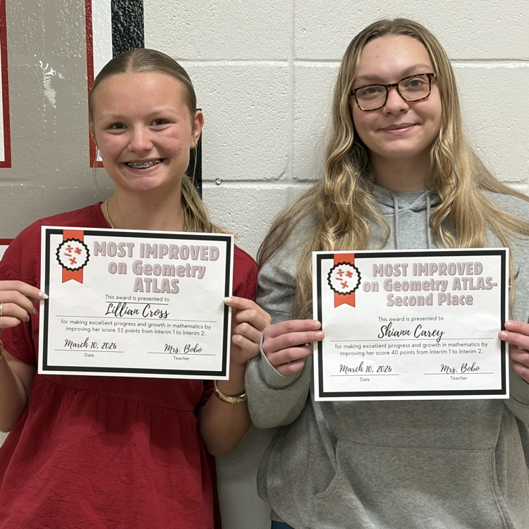 picture of girls holding certificates