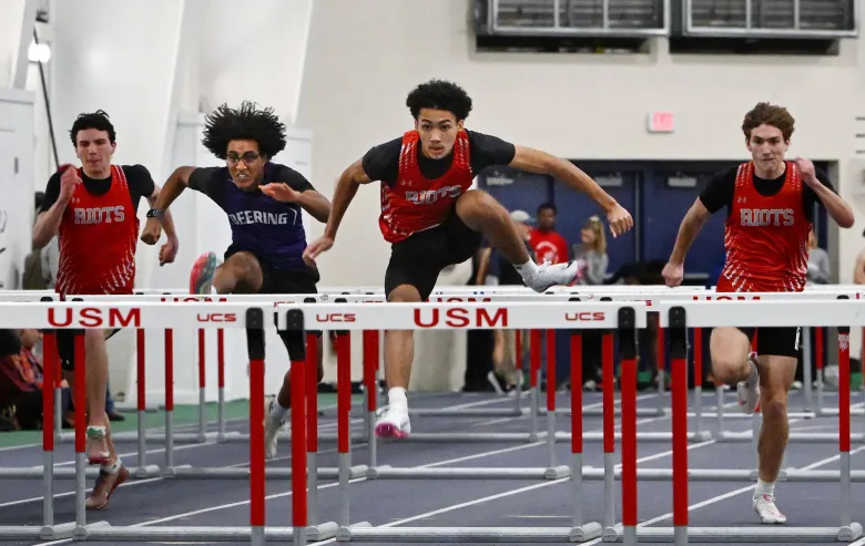 South Portland's Devin Berry leads the boys 55-meter hurdles. Berry finishing in 7.75. (Shawn Patrick Ouelette/Staff Photographer)