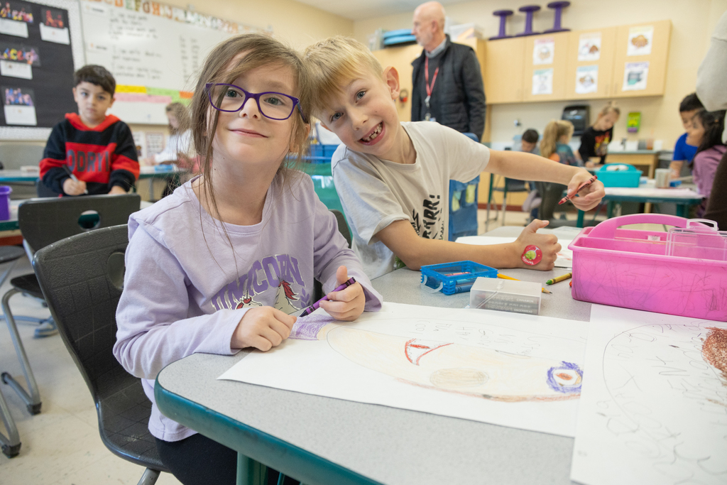 First graders at Kaler Elementary creating self portraits