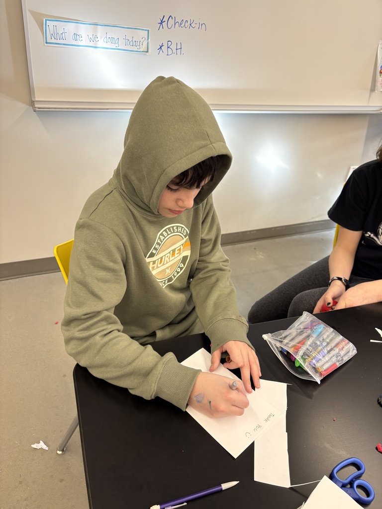 SPMS student creating thank you card for school board members.