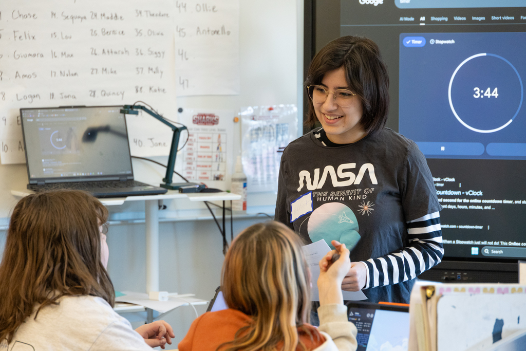 University of New England students teaching a lesson on the solar system and constellations.