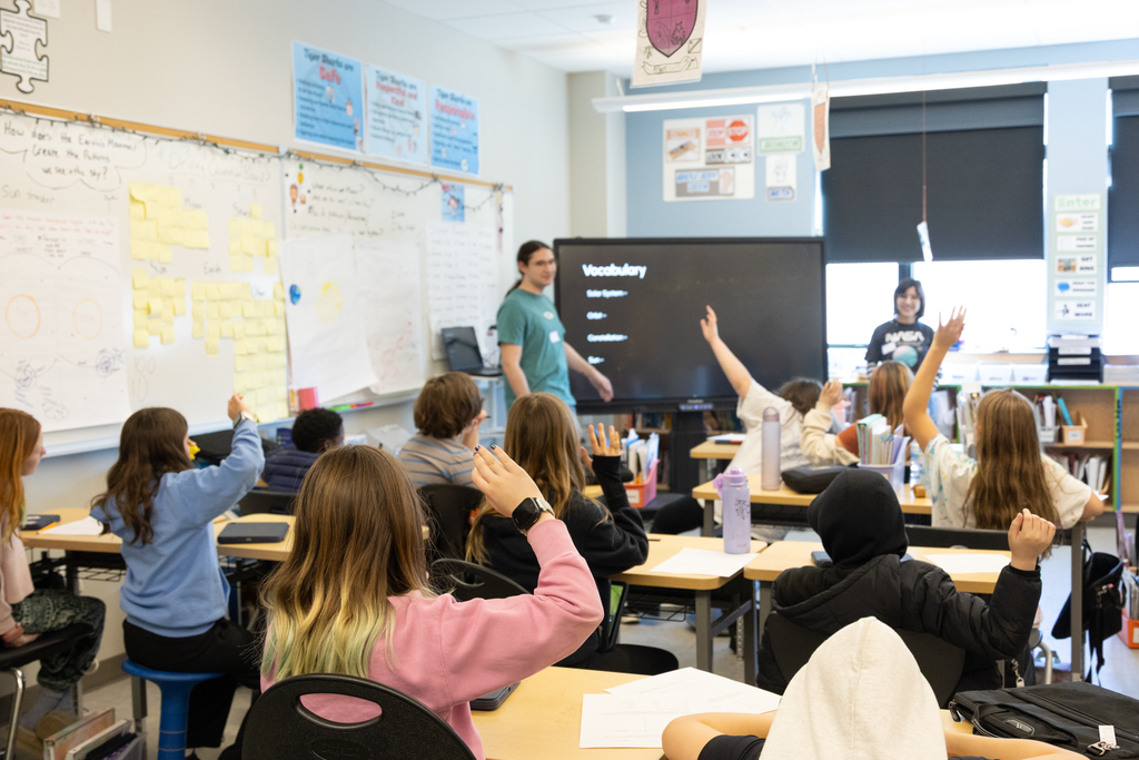 University of New England students teaching a lesson on the solar system and constellations.