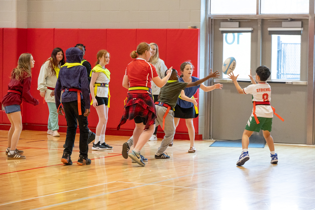 Students playing rugby during World Cultures Day.