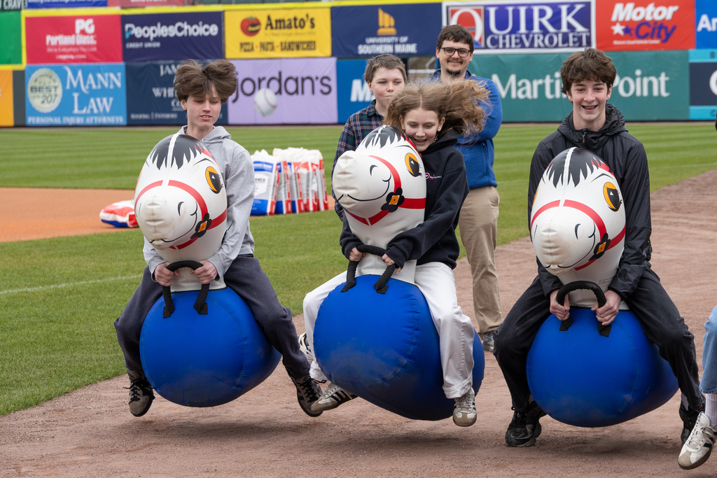 South Portland Middle School students racing on the field