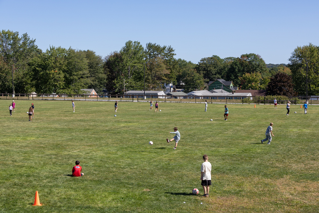 Students playing soccer on the middle school field