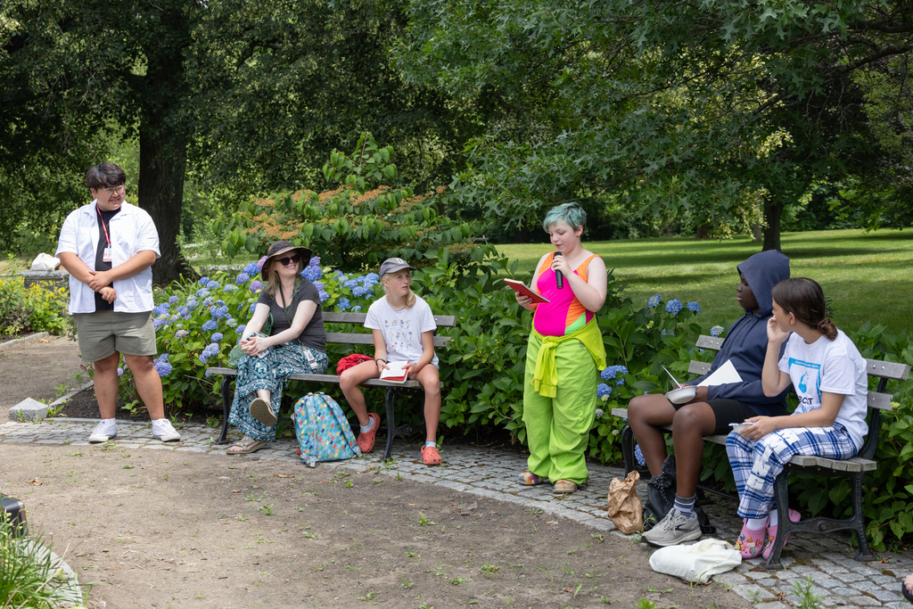 Students reading their writings aloud at Mill Creek Park
