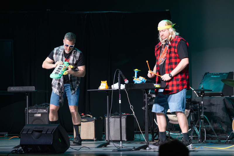 SPMS Talent Show & Fundraiser - staff members performing wearing silly costumes and playing toy instruments