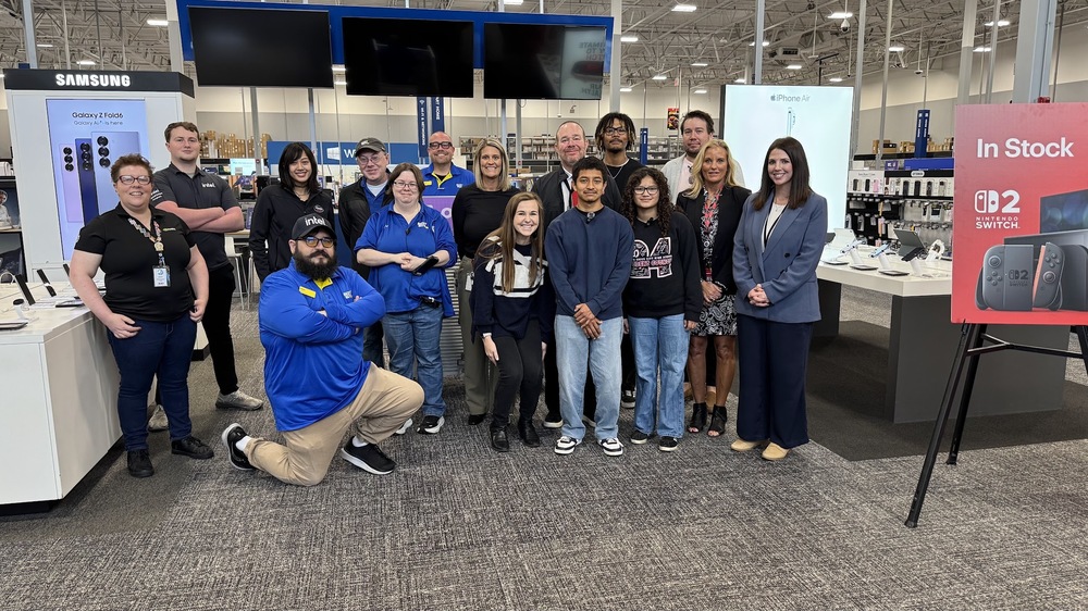 Intel presents $20 check