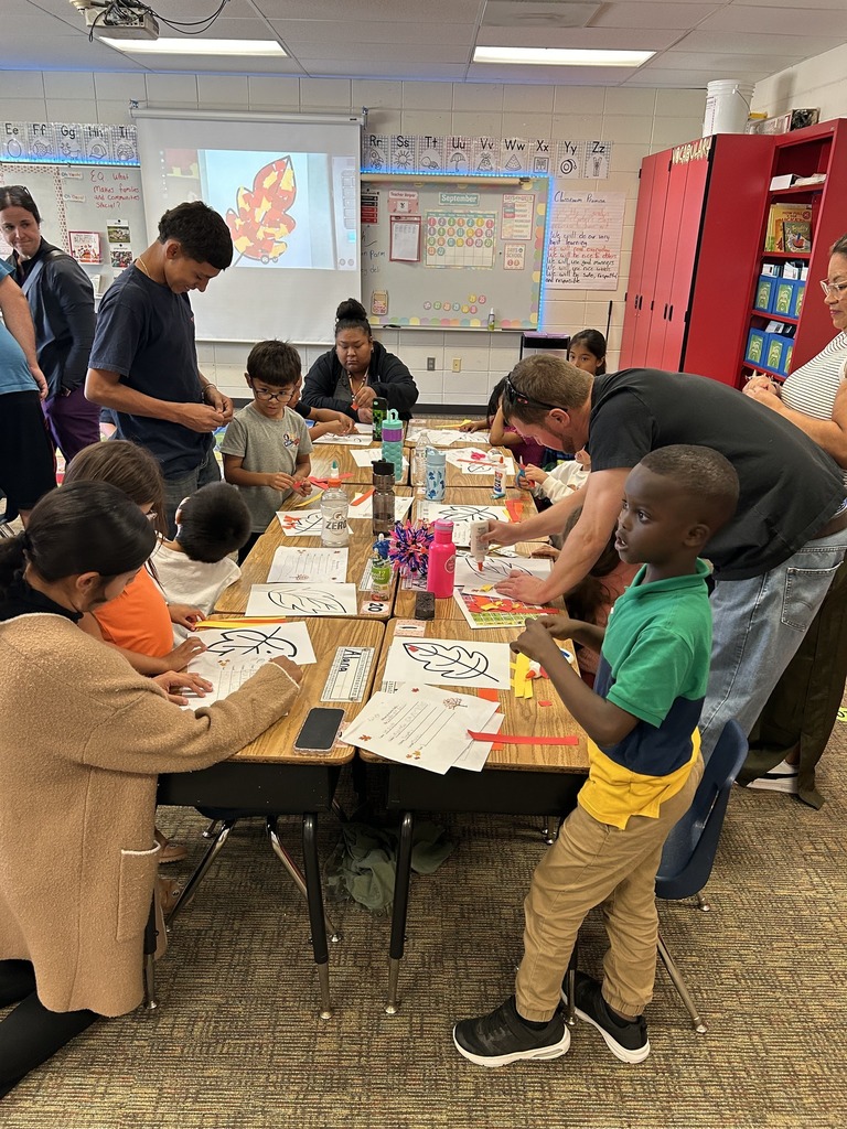 Parents and students working on some assignments together