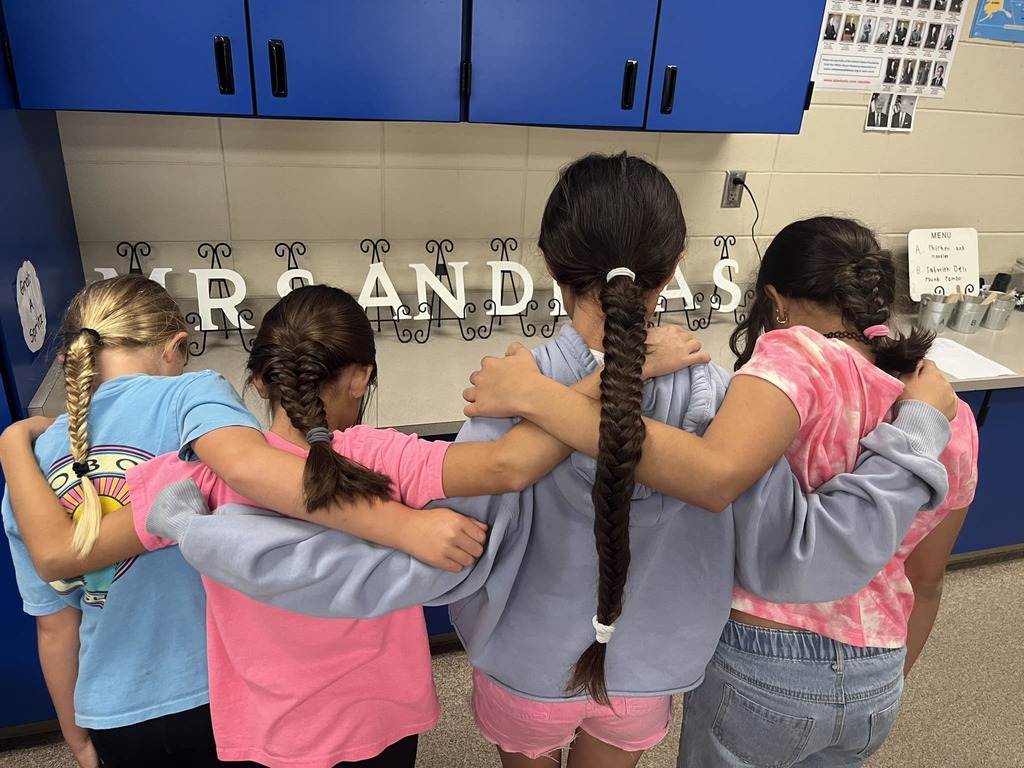 Four girls showing similar braids