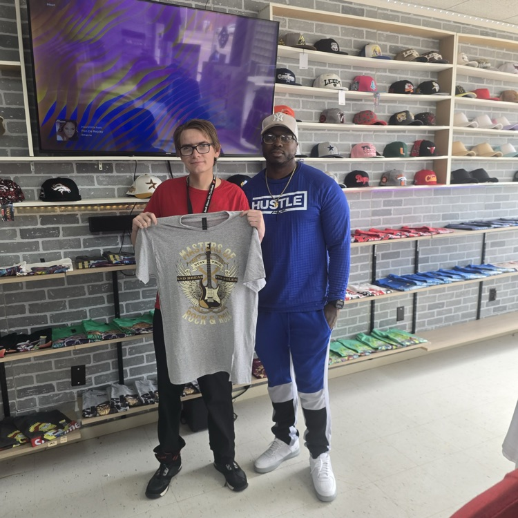 picture of student shadow experience with business owner Terrance