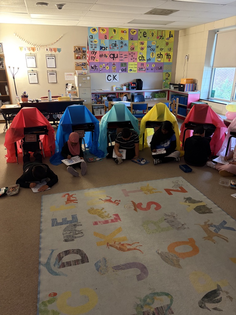 kids camping in the classroom.