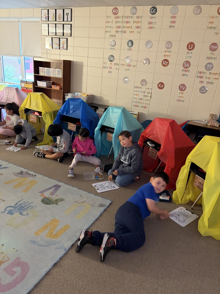 kids camping in the classroom.