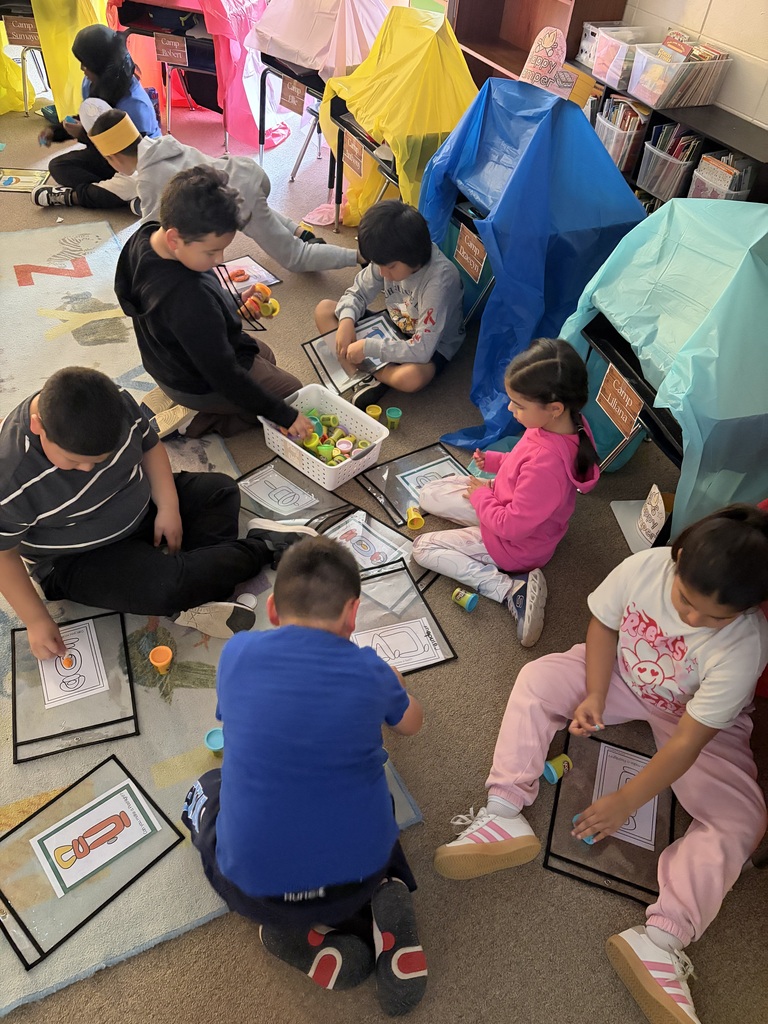 kids camping in the classroom.