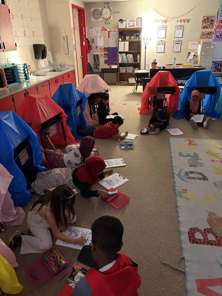 kids camping in the classroom.