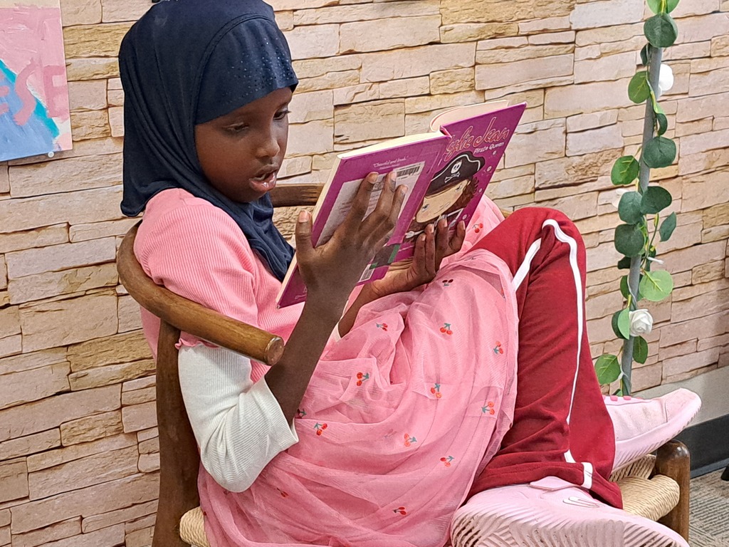 students reading books