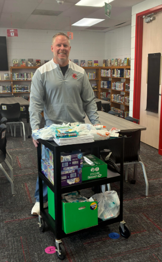 principal with school supplies