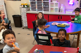 students enjoying popsicles