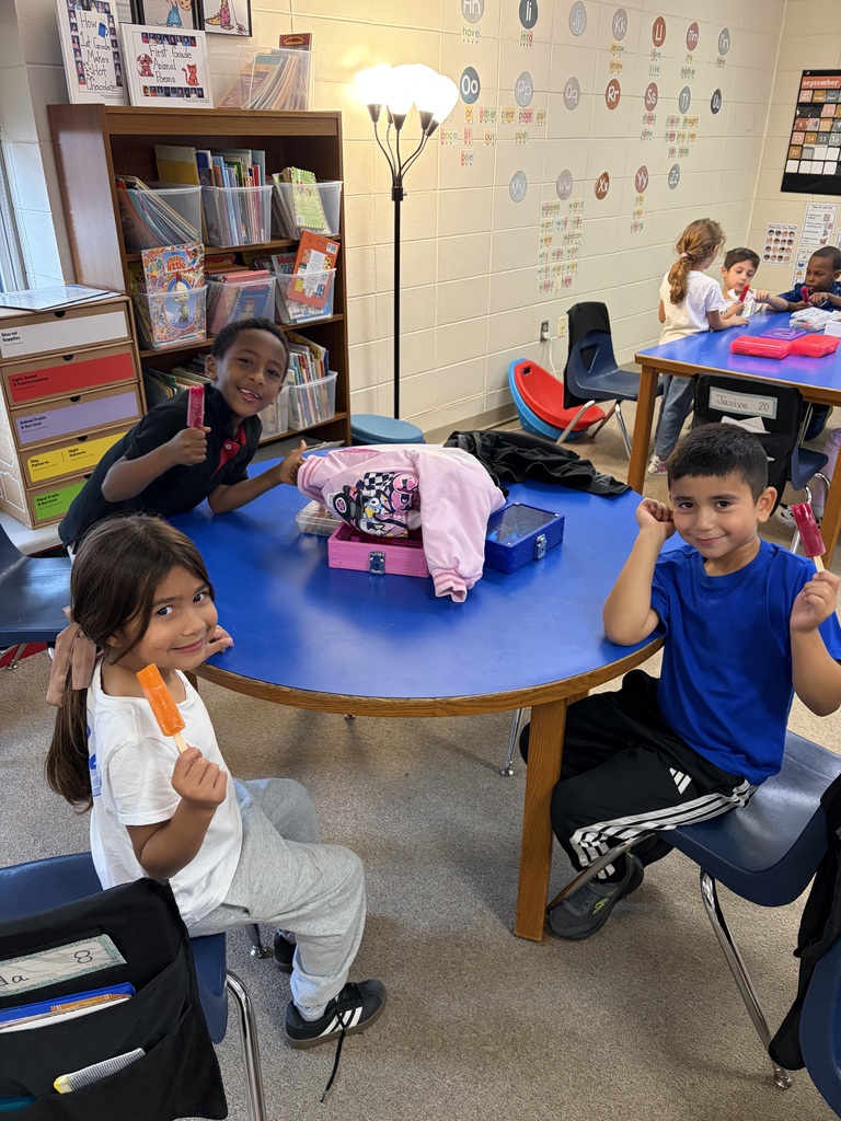 students enjoying popsicles