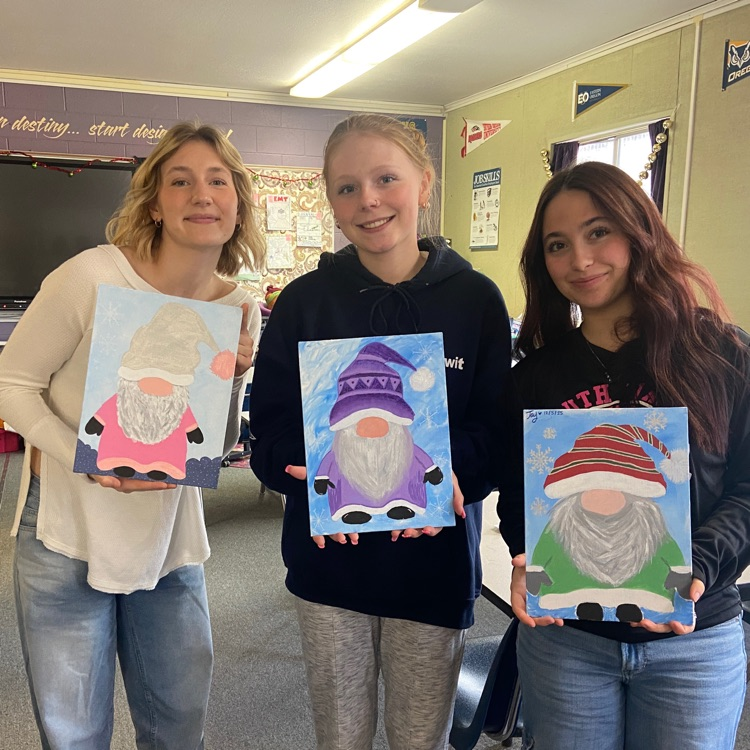 seniors posing with their gnome Art