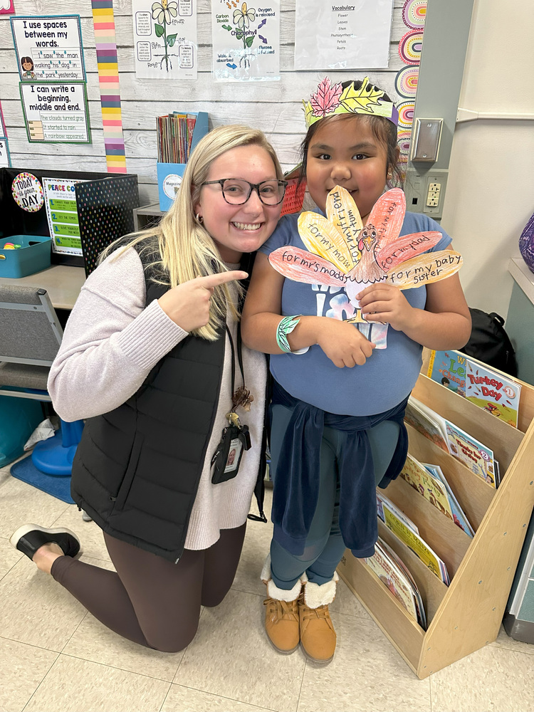 Thankful student with teacher