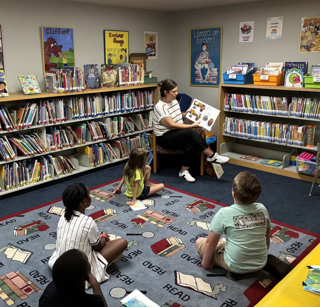 MITS advisor reading a book