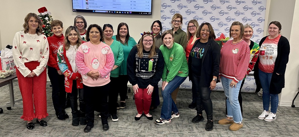 employees dressed in Christmas apparel