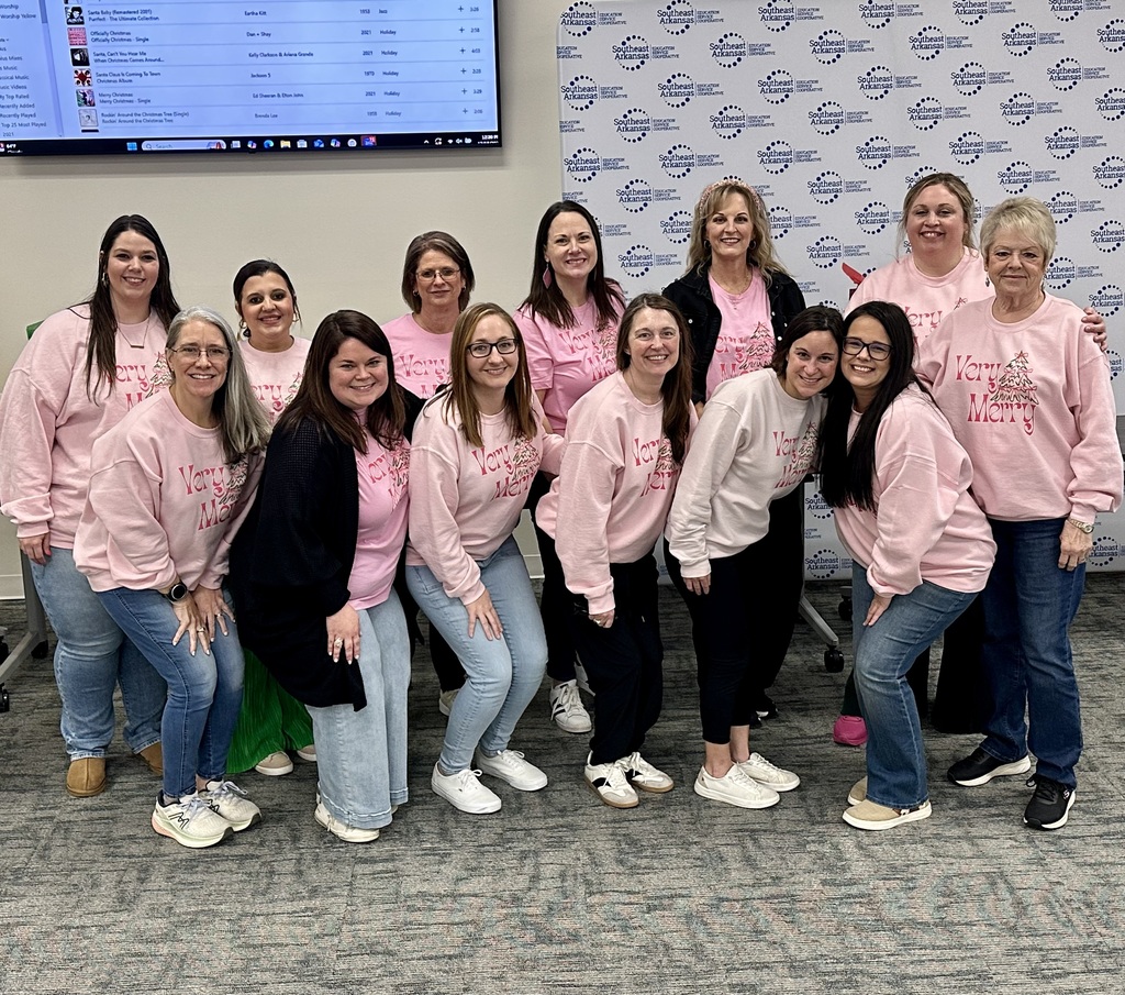 employees dressed in Christmas apparel