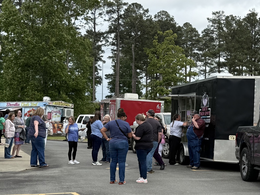 People enjoying food truck Friday 
