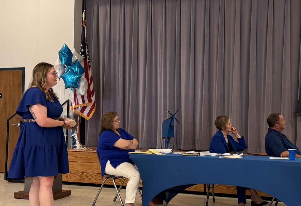 Math Specialist presenting testing numbers  