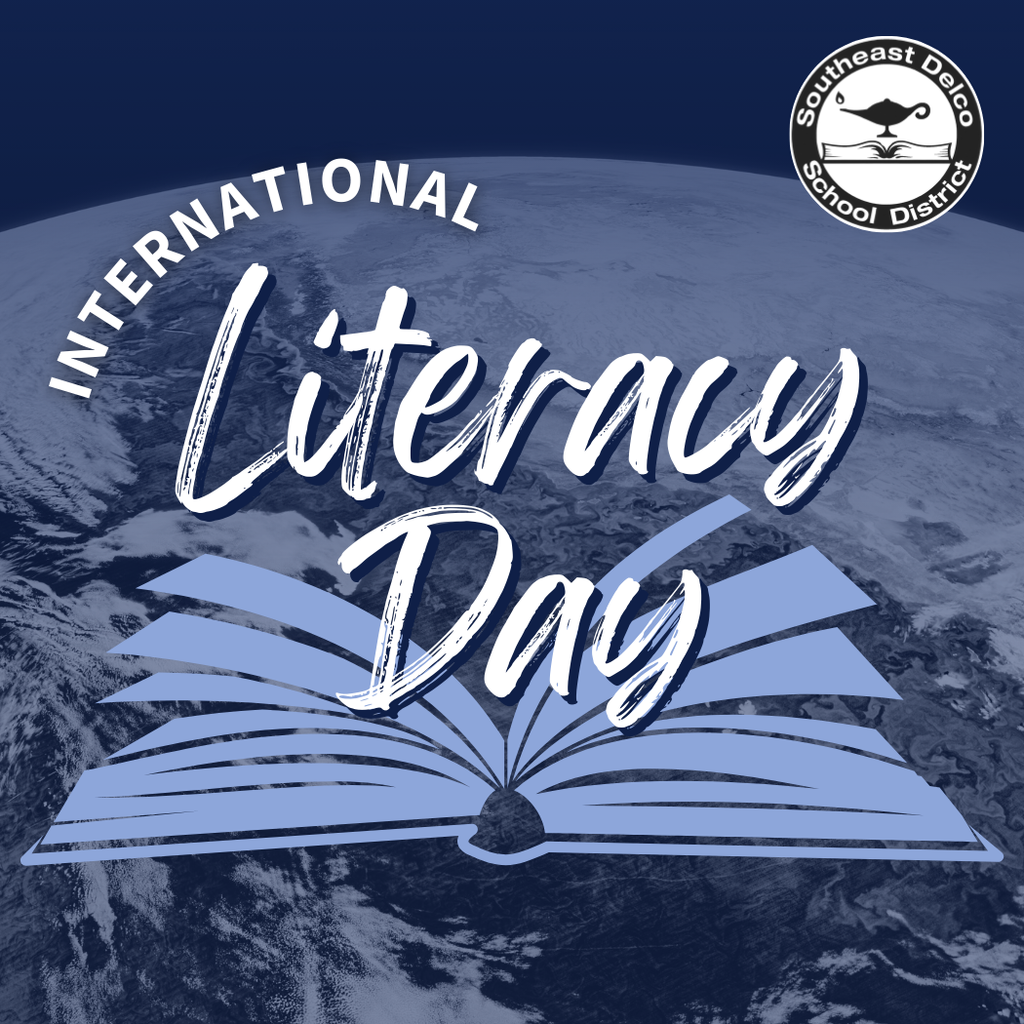 Blue and white graphic with the Earth in the background. Large text reads “International Literacy Day.” An open book illustration is centered at the bottom. The Southeast Delco School District logo appears in the top right corner.