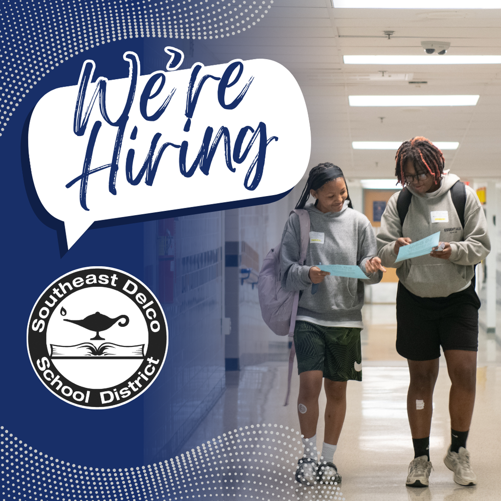 Graphic with text inside a speech bubble that says: 'We’re Hiring.' On the right, two students wearing gray sweatshirts and backpacks walk down a school hallway while holding papers and smiling. Bottom left corner features the Southeast Delco School District logo.