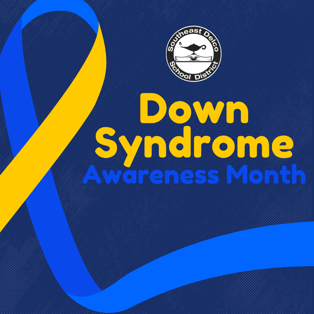 A dark blue background graphic features a large yellow and blue awareness ribbon that curves across the left and bottom of the design. To the right, bold text reads: “Down Syndrome Awareness Month” with “Down Syndrome” in yellow and “Awareness Month” in blue. The Southeast Delco School District logo is displayed above the text.